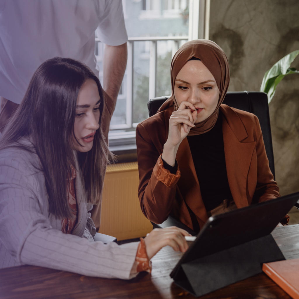 two diverse women working together on a consulting appointment