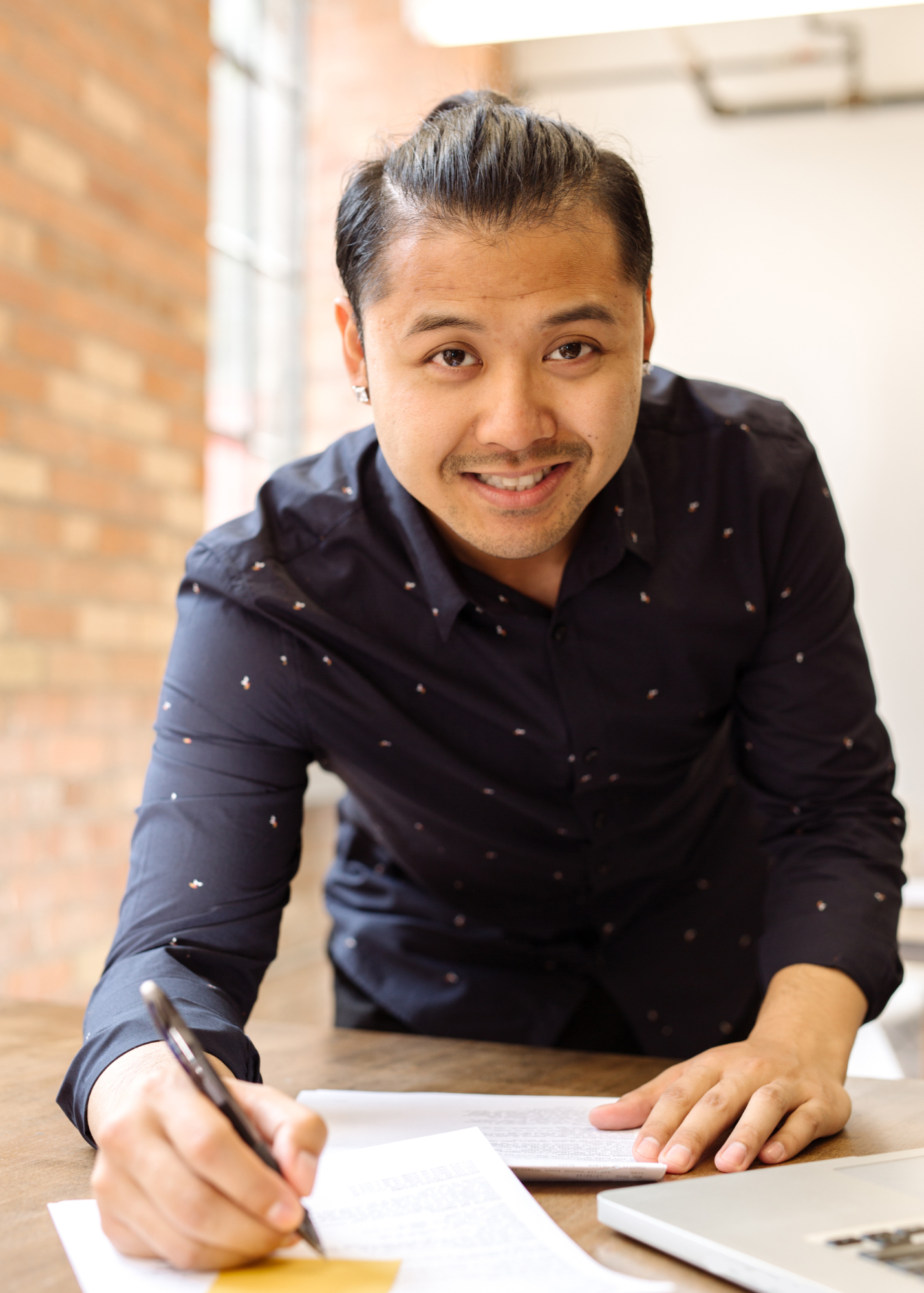 Asian man having an empowering and health workplace