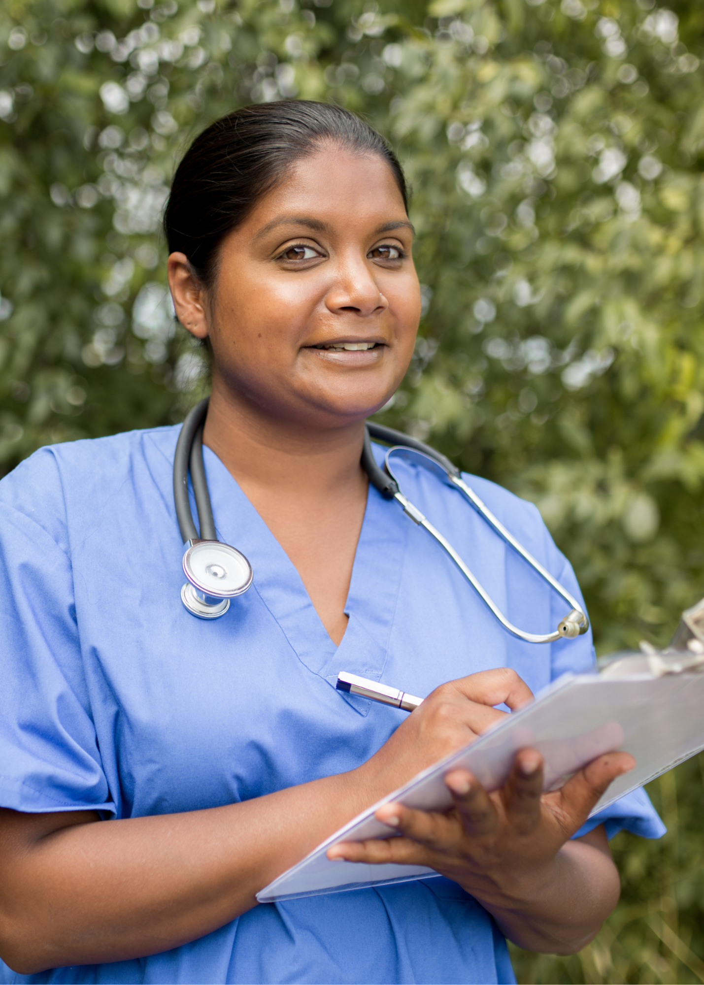 Nurse smiling from her healthy and intentional workplace